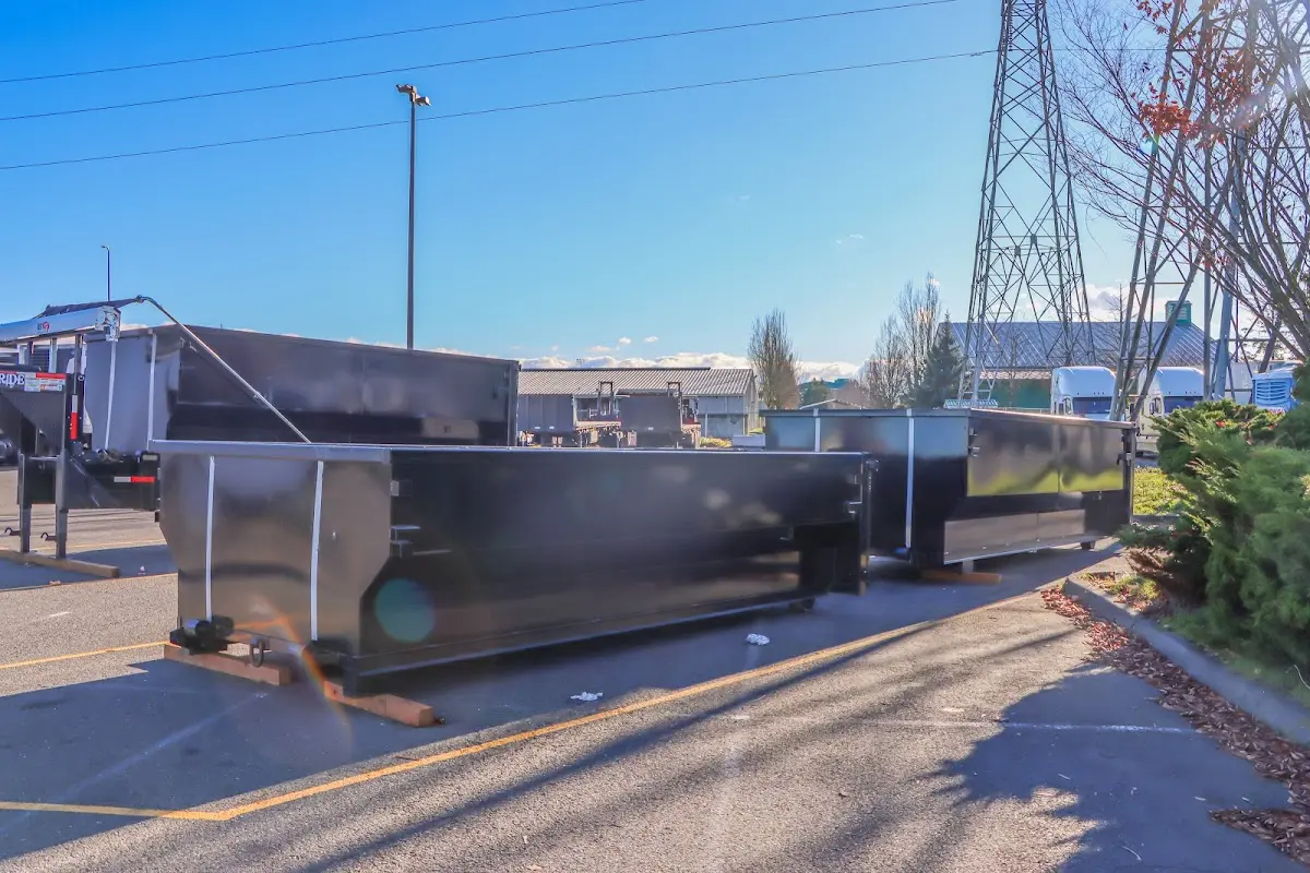 Roll-off dumpster ready for waste disposal at job site for 15 Yard Dumpster Rental in Branson